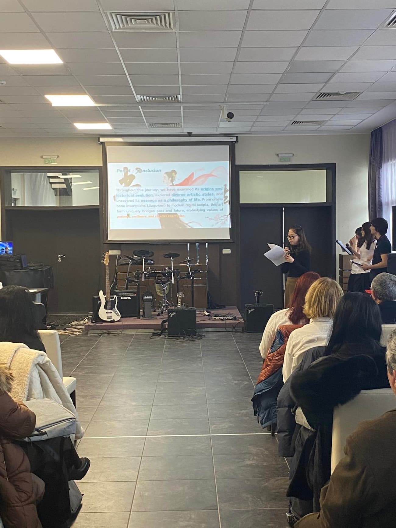 Photo 1: Calligraphy demonstration