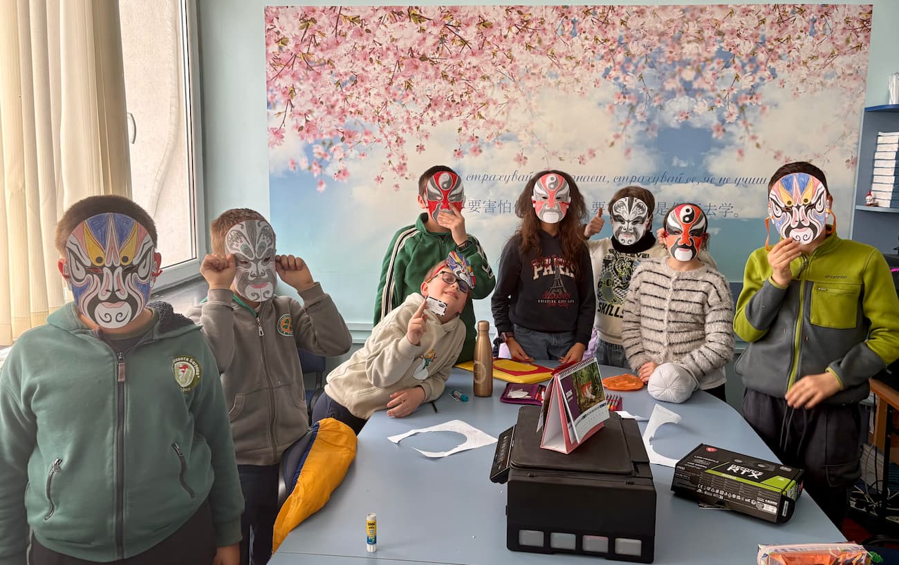 Photo 4 Students wearing the masks they crafted